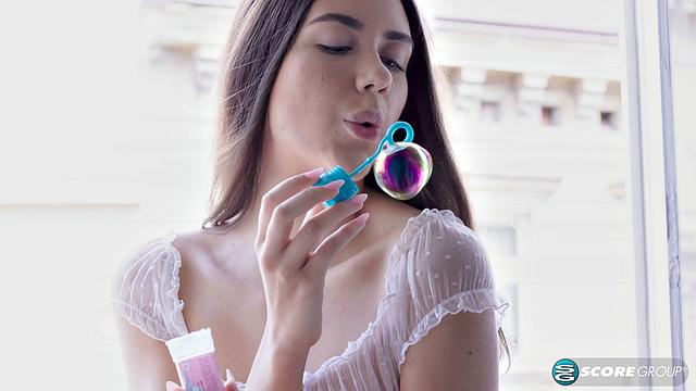 Slim and horny 18-Year-Old Vixi Rafi wears a sheer top, flashes pussy, and fucks a big dick