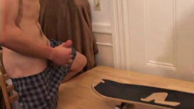 Horny amateur Brent Stenson strokes out a load on the kitchen table.