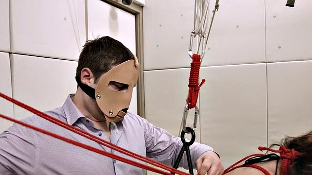 Bound kinky slut sucking on a dick