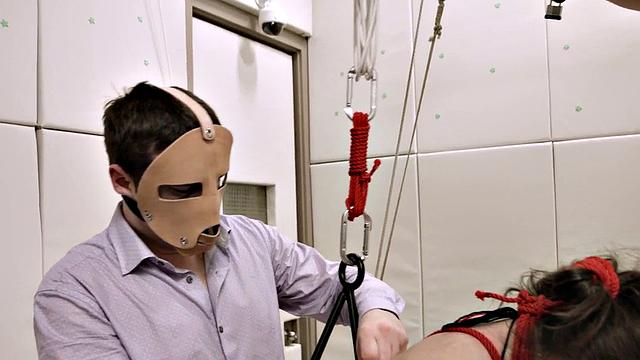 Bound kinky slut sucking on a dick