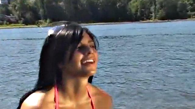 Gorgeous petite teen teases at the beach