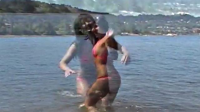 Gorgeous petite teen teases at the beach