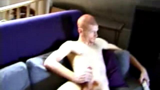 two horny guys stroke side by side and show off their loads