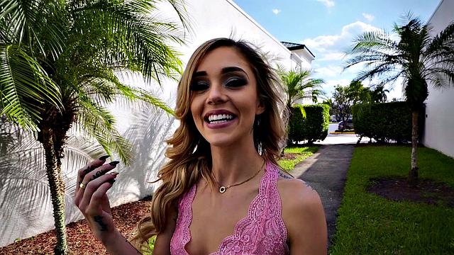 Watch Kali's piercing get a rough handjob in the living room