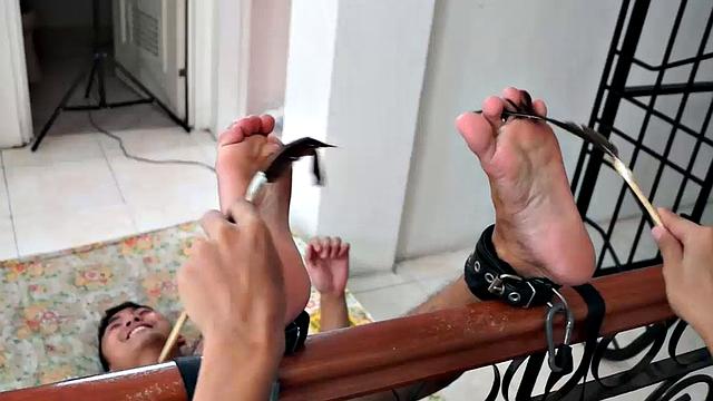 Lance returns in this tickling endurance combo. Lance's ankles are bound to the stair banister soles up. Our cutie pie boy tickler Warren tickles his feet. Lance's soles are incredibly smooth and soft like silk.