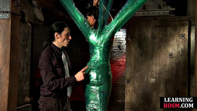 Tied-up BDSM slut fingered by master