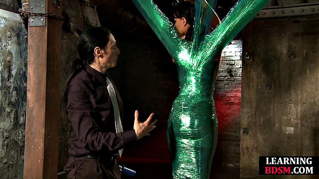 Tied-up BDSM slut fingered by master