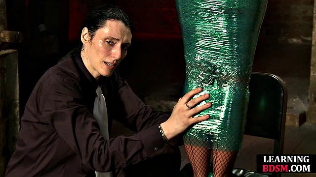 Tied-up BDSM slut fingered by master