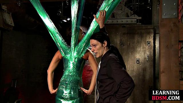 Tied-up BDSM slut fingered by master