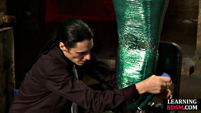 Tied-up BDSM slut fingered by master