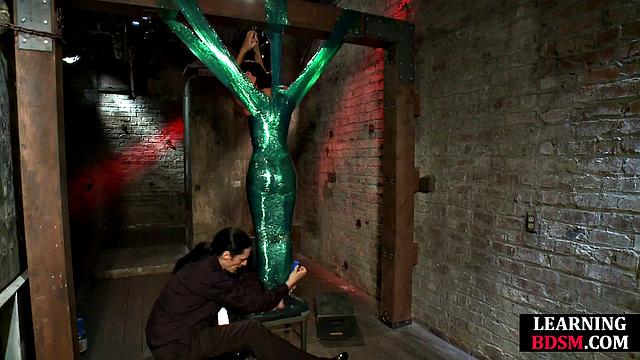 Tied-up BDSM slut fingered by master