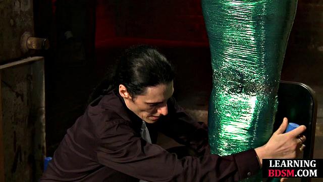 Tied-up BDSM slut fingered by master