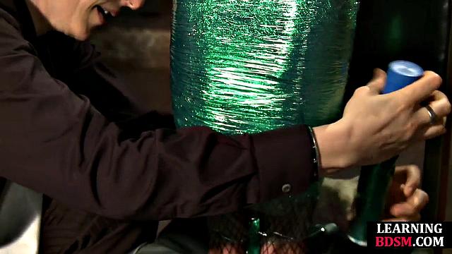 Tied-up BDSM slut fingered by master