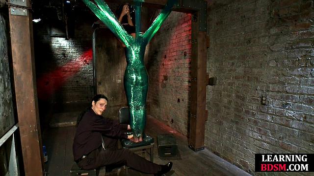 Tied-up BDSM slut fingered by master