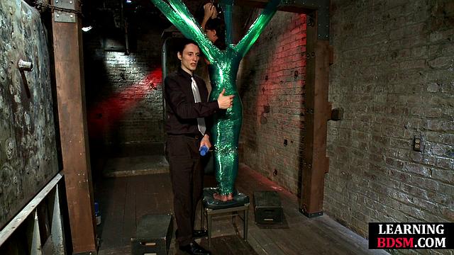 Tied-up BDSM slut fingered by master