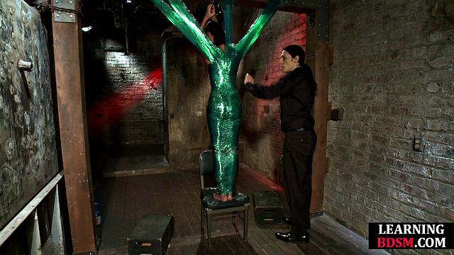 Tied-up BDSM slut fingered by master