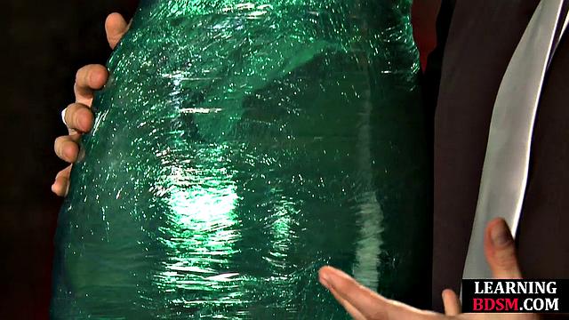 Tied-up BDSM slut fingered by master