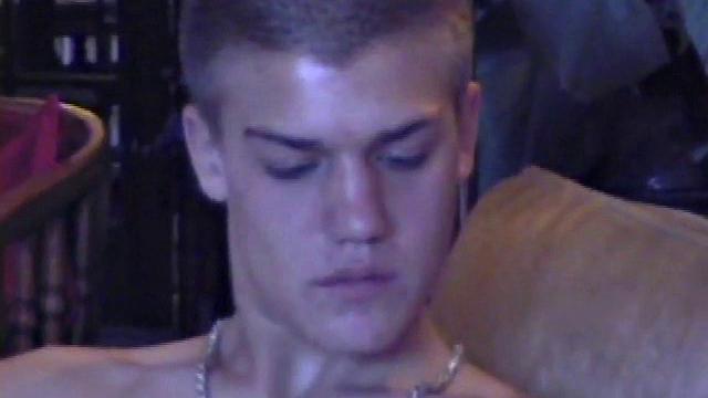 Lance starts out this solo scene sitting on the sofa with his sweats pushed down just below his balls. Lance talks to the camera a little, asking if we like his cock.