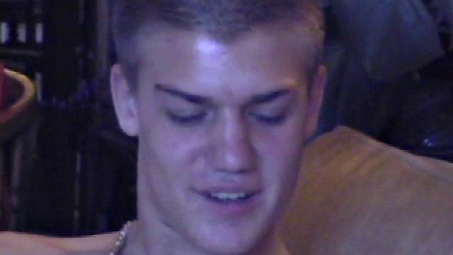 Lance starts out this solo scene sitting on the sofa with his sweats pushed down just below his balls. Lance talks to the camera a little, asking if we like his cock.