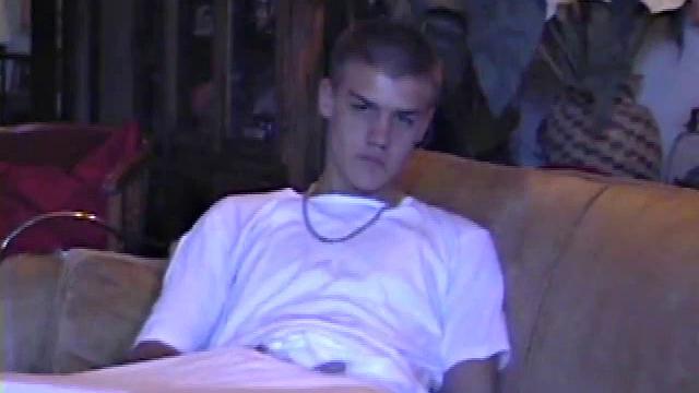 Lance starts out this solo scene sitting on the sofa with his sweats pushed down just below his balls. Lance talks to the camera a little, asking if we like his cock.