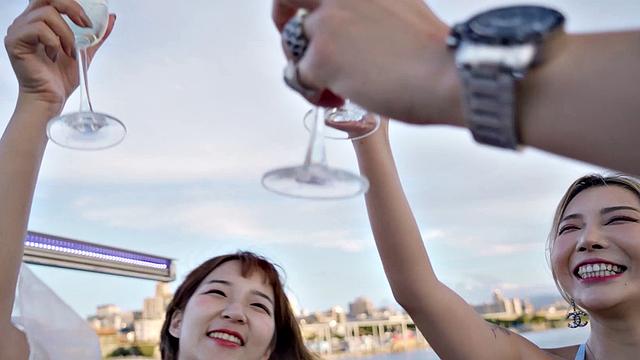 Stacy and frienss spend the day on a boat playing and having fun