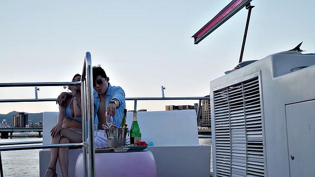 Stacy and frienss spend the day on a boat playing and having fun