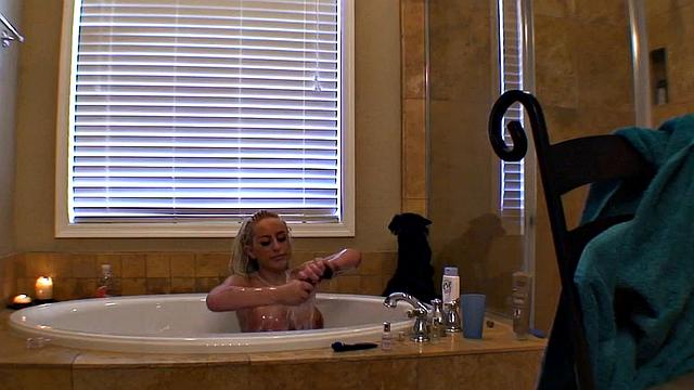 Savannah Gold, the blonde amateur whore, gets down and dirty in the bathroom