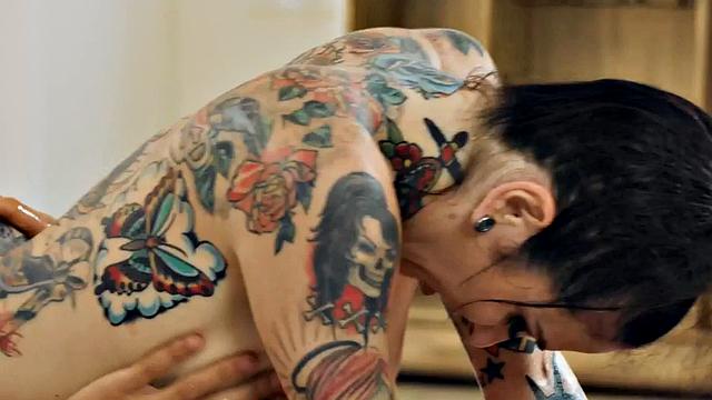 WAM tattooed masseuse deepthroats and rides cock