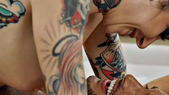 WAM tattooed masseuse deepthroats and rides cock