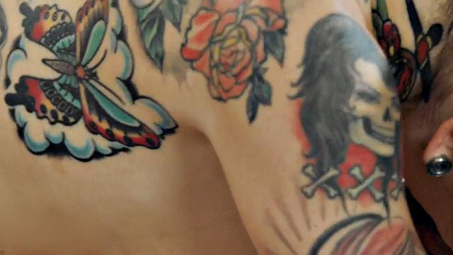 WAM tattooed masseuse deepthroats and rides cock