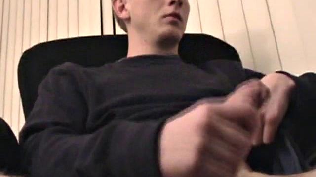 Young Corbin is back and this time, he's at his computer working a growing bulge inside his sweats. When he tugs down the sweats, we see his boner.