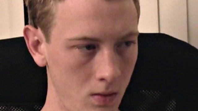 Young Corbin is back and this time, he's at his computer working a growing bulge inside his sweats. When he tugs down the sweats, we see his boner.