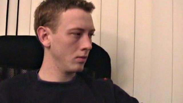 Young Corbin is back and this time, he's at his computer working a growing bulge inside his sweats. When he tugs down the sweats, we see his boner.