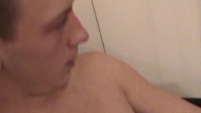 Young Corbin is back and this time, he's at his computer working a growing bulge inside his sweats. When he tugs down the sweats, we see his boner.