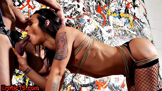 Submissive trans throatfucked by dom