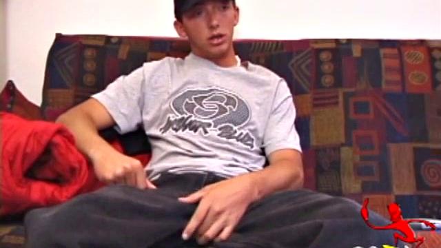 Young and horny Trevor works his cock through his pants, before stripping naked. After some slippery cock stroking, he pumps out a warm load onto his stomach.