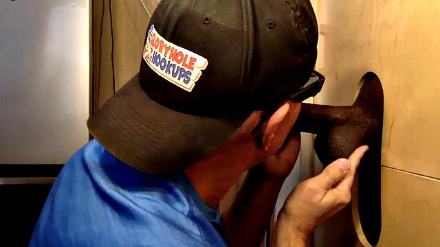 Tattooed gloryhole DILF sucks Black cock with cum