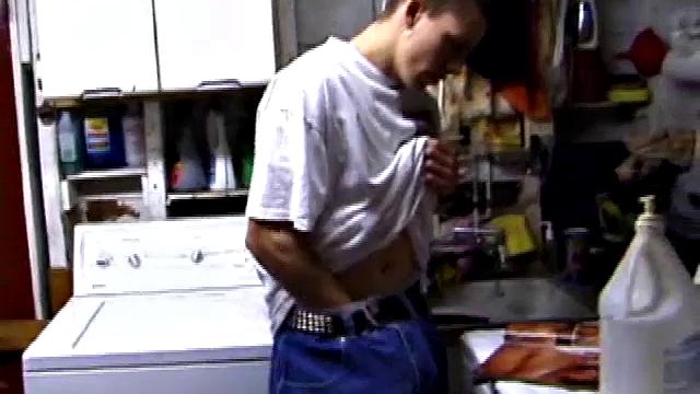 Returning home with a new porn magazine, Shane heads to the laundry room to check out his new porn rag and jerk off. The porn must be good because he quickly gets stiff and starts stroking.