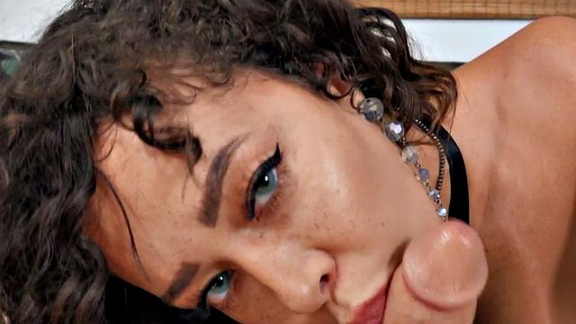 Curly-haired babe gives head before getting drilled from behind in doggystyle