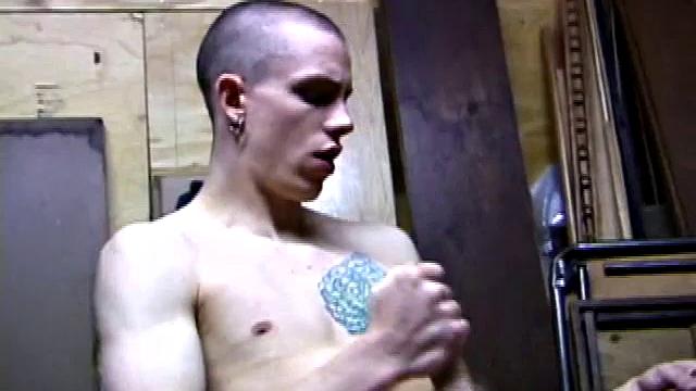 Returning home from work, Shane grabs a porn magazine and heads for the garage. There, he strokes his hard cock, while eating his pre-cum, and then pumps onto his belly.