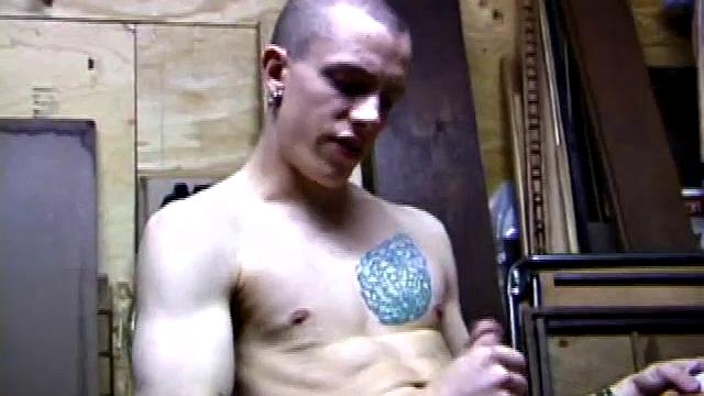 Returning home from work, Shane grabs a porn magazine and heads for the garage. There, he strokes his hard cock, while eating his pre-cum, and then pumps onto his belly.