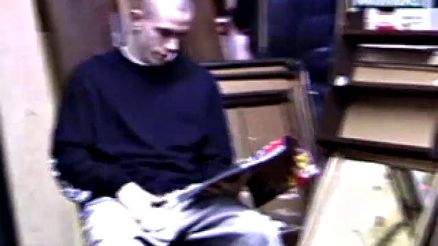 Returning home from work, Shane grabs a porn magazine and heads for the garage. There, he strokes his hard cock, while eating his pre-cum, and then pumps onto his belly.