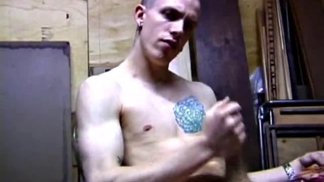 Returning home from work, Shane grabs a porn magazine and heads for the garage. There, he strokes his hard cock, while eating his pre-cum, and then pumps onto his belly.