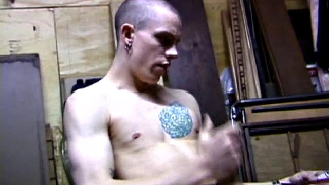 Returning home from work, Shane grabs a porn magazine and heads for the garage. There, he strokes his hard cock, while eating his pre-cum, and then pumps onto his belly.