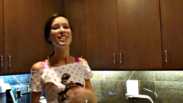 Brunette BrookeSkye rubs her tight bald pussy in the kitchen