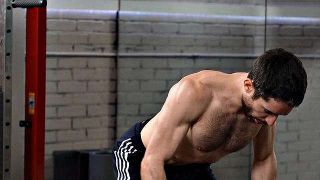 Eager jock with hairy chest wanking