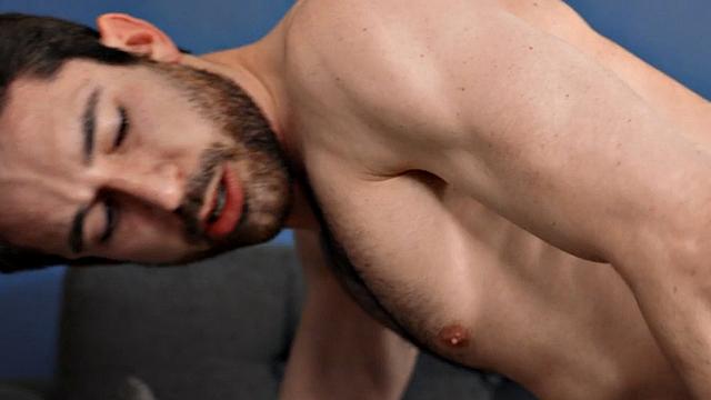 Eager jock with hairy chest wanking