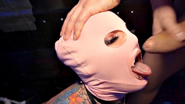 Inked masked MILF banged by priest gets cum in mouth