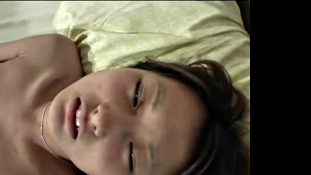 Watch this Japanese babe with small tits pleasure herself with close-up pussy play and sex toys