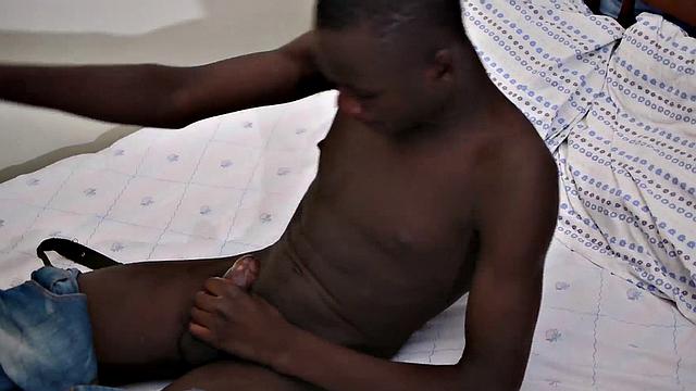 Real Nubian 21yo amateur jerks his black cock and cums